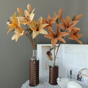 Close-up view of artificial lily flower in retro oil painting tones for interior decoration.