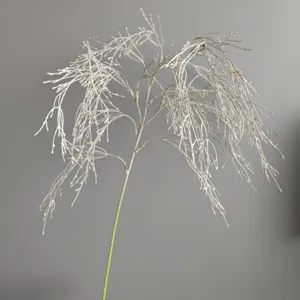 Détail de racine de banyan artificielle avec texture de branche blanche pour déco florale.