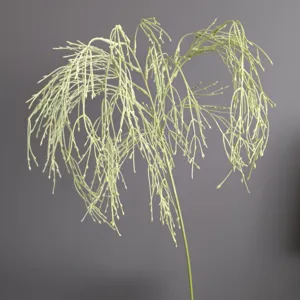 Vue détaillée de branche de banyan pleureur artificielle, feuillage décoratif vert clair.