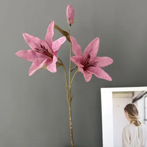 Artificial lily flower stem detail, oil painting style faux floral home decoration.