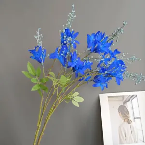 Blue artificial wild bamboo flower detail, realistic fake floral decor for home and events.