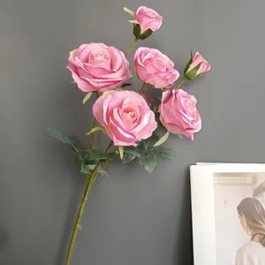 Artificial pink rose flower branch detail, silk rose stems for home wedding decor.