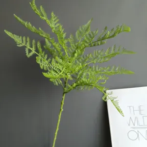 Artificial soft rubber fern branch detail view, perfect for Nordic home and hotel decor.