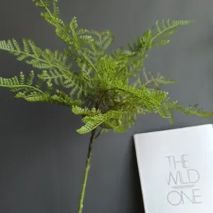 Artificial maidenhair fern green plant single branch detail view for home decor and styling
