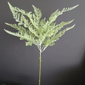 Artificial fern branch detail, soft glue green plant stem for modern home wedding decor.