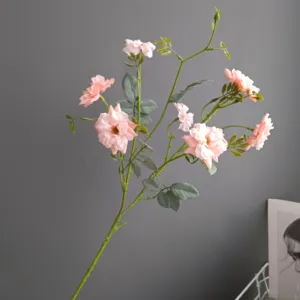 Artificial pink rose branch, fake wild flower stem for home decor, wedding and party styling.