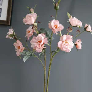 Artificial pink rose camellia flowers branch fake floral stems for home room wall decor.