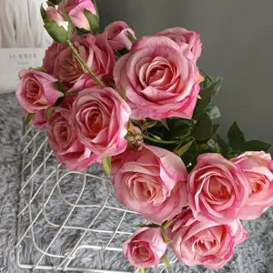 Artificial pink rose flower bouquet detail shot for Nordic home decor and wedding arrangement.