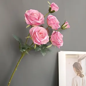 Artificial pink rose bouquet detail, handmade burnt edge fabric flowers for home decor wedding.