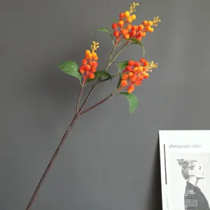 Artificial berry branch detail, orange foam fruit simulation plant for home decor and floral art.