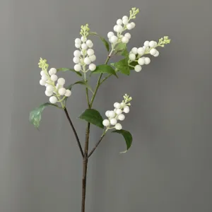 Artificial white berry branch for home decor, floral arrangement, and wedding decoration.