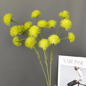 Artificial yellow pompon dandelion flower stems for home decor and wedding arrangement.