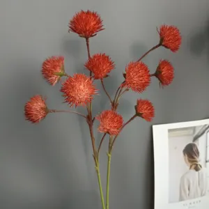 Artificial red spiky flower bouquet for home decor, wedding arrangement, and interior styling.