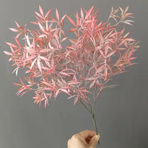 Close up detail of artificial flocked pink clover branch, perfect for floral arrangement DIY.