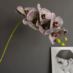 Splendido ramo di orchidea phalaenopsis artificiale con 7 fiori in silicone realistici.