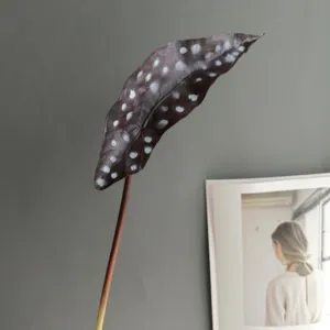 PU trout begonia leaf detail shot, artificial plant decoration for Nordic home staging.
