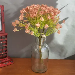 Artificial baby's breath flowers bouquet with clear glass vase for home decor detail