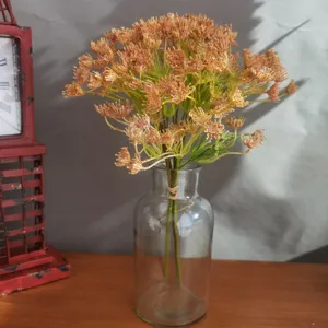 Artificial baby's breath flower bouquet with clear glass vase for Nordic home decor style.