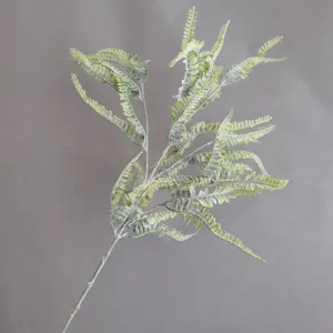 Artificial flocked fern leaf detail shot, frosted green foliage stem for home decor arrangement.