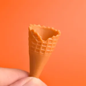 Miniature resin ice cream cone detail, perfect for DIY phone case charm and miniature food play.