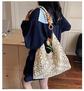 Handcrafted straw woven shoulder bag for women, casual beach vacation hobo bag with beads.