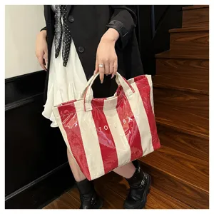 Red and white striped coated canvas tote bag detail view, large capacity beach bag.