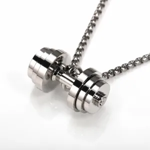 Detail view of men fitness dumbbell pendant necklace in stainless steel trendy sports jewelry.