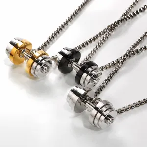 Detailed view of men fitness dumbbell pendant, high quality stainless steel necklace texture.