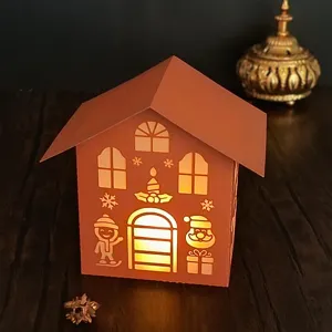 Laser cut paper house night light Christmas holiday decoration warm glow LED lamp detail