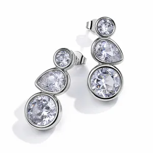 Silver drop earrings featuring sparkling round and pear cut zirconia stones for women.