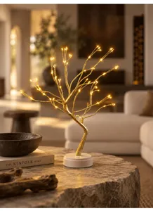 Detailansicht der LED Lichterbaum Lampe mit warmen Kupferzweigen und gemütlicher Beleuchtung.