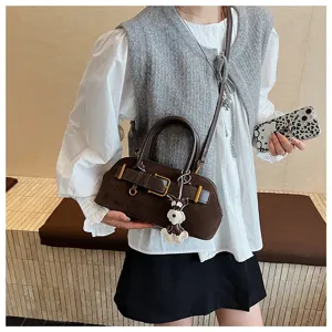 Koreanische braune Wildleder Handtasche mit Metallchnalle und Hundemotiv fuer Damen.