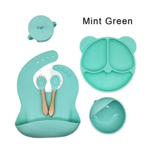Mintgroene baby siliconen voeding set details, schattig beren zuignap bord en kom.
