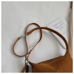 Brown suede shoulder bag minimalist vintage underarm handbag with adjustable strap and chic charm