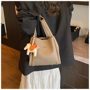 Korean style PU leather bucket bag retro shoulder handbag with cute pegasus charm accessory