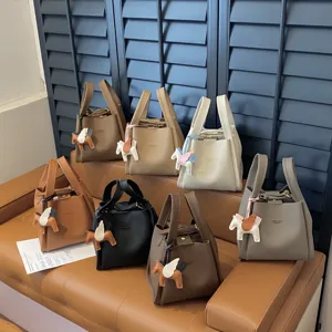 Korean style PU leather bucket bag retro shoulder handbag with cute horse charm for women
