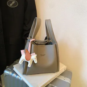 Korean style bucket bag retro shoulder bag fashion leather handbag with cute horse charm and top handles