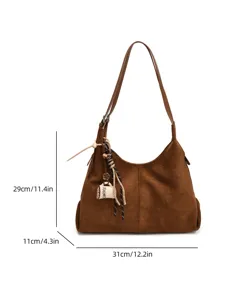Vintage brown suede shoulder bag detail showing dimensions and elegant coffee cup charm.