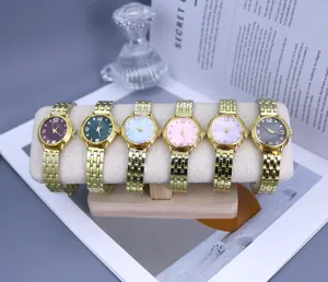 Women fashion quartz watch with round radial dial and metal link strap for daily wear style.