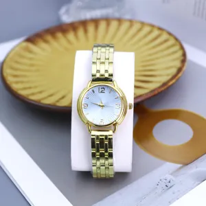 Women gold quartz watch with stylish metallic link strap and elegant radial pattern dial.