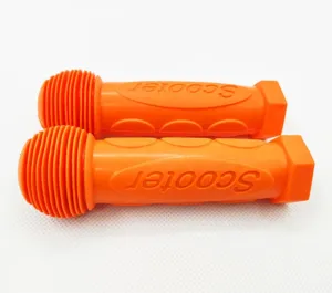 Orange rubber scooter handlebar grips replacement pairs for kids balance bikes and scooters.