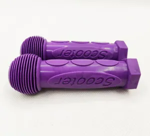 Purple rubber scooter handlebar grips detail shot, soft texture for kids balance bike safety.