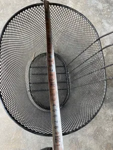 Detail view of a black metal wire bicycle front basket showing size and mesh design structure.