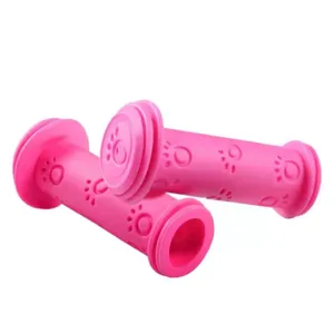 Pink rubber handlebar grips detail, anti-slip paw print design for kids balance bike scooter.