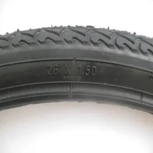 Detailed view of the bicycle tire surface, showing tread pattern and size 26x1.50.