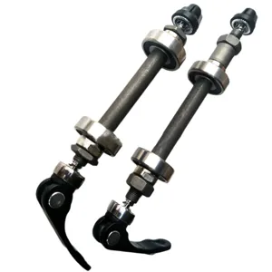 Bicycle quick release hollow axle detail view with bearings and secure fastening mechanism parts.