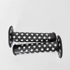 Black bicycle handlebar grips with white star pattern for mountain and fixed gear bikes