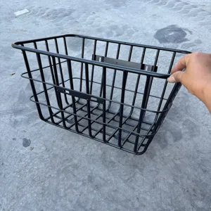 Durable black metal wire rear basket for electric bikes, sturdy universal storage carrier.