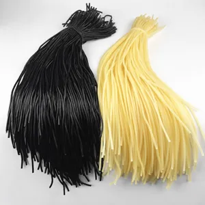 Bicycle valve rubber tubes, black and yellow rubber bands for old bike tire repair.