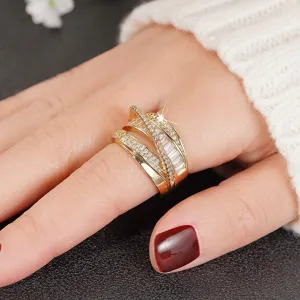 Fashionable multi-layer cross gold ring with sparkling cubic zirconia for women, elegant luxury style.